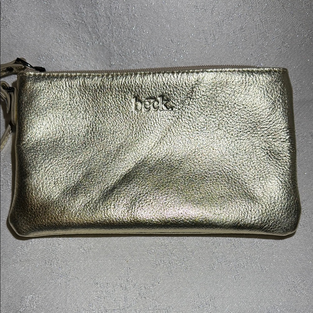 beck Glamorous Gold Wristlet with Shimmering Metallic Finish